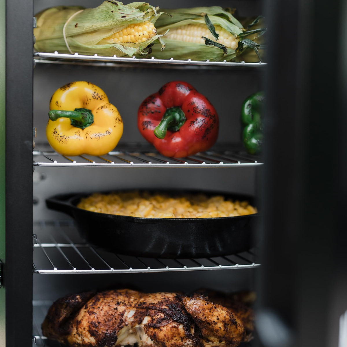 Masterbuilt® 30-inch Digital Electric Vertical BBQ Smoker with Side Wood Chip Loader, Chrome Racks and 710 Cooking Square Inches in Black, Model MB20071117