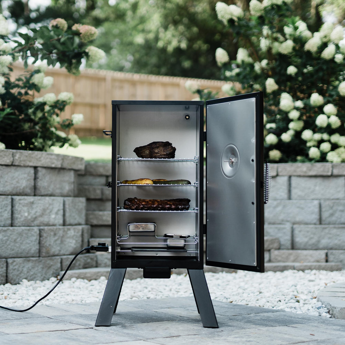 Masterbuilt® 30-inch Digital Electric Vertical BBQ Smoker with Side Wood Chip Loader, Chrome Racks and 710 Cooking Square Inches in Black, Model MB20071117